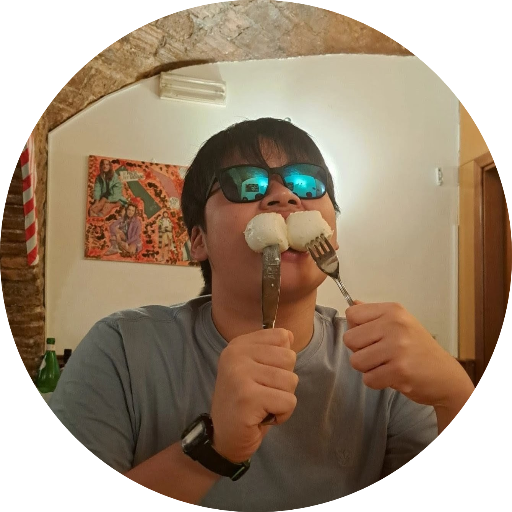 Charles Eating 2 Mozzarella Balls